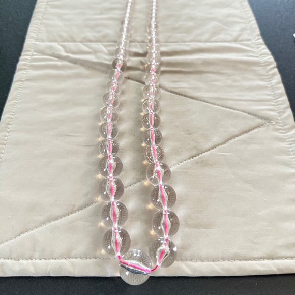 Source Unknown Jewelry - Graduating clear glass bead necklace strung on hot pink string. Lobster clasp